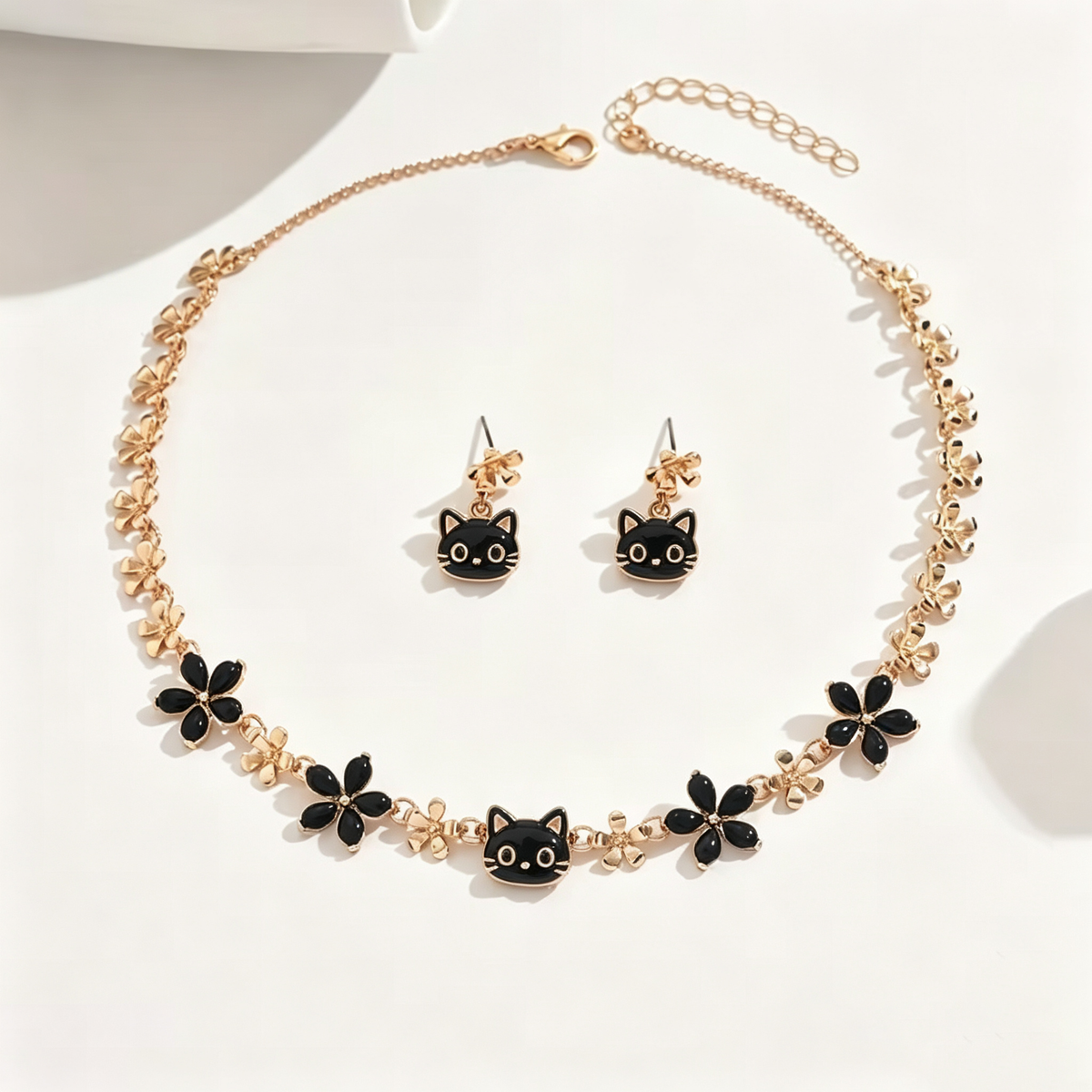 Playful Black Cat and Blossom Necklace and Earrings Set